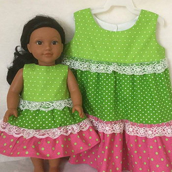 Matching girl's and doll's dresses from All Dolled Up, North Bay, Ontario